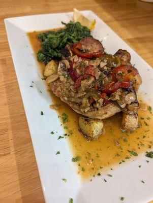 Pork Chop , fingerling tomatoes and broccoli rabe