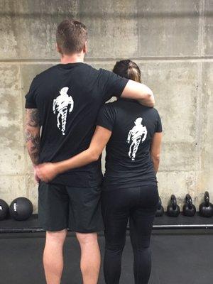 Couples that train together, stay together!  Looking good in the Human Fitness his/hers black T-shirt!