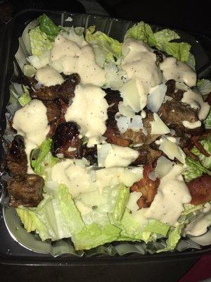 Steak tip Caesar salad with bacon