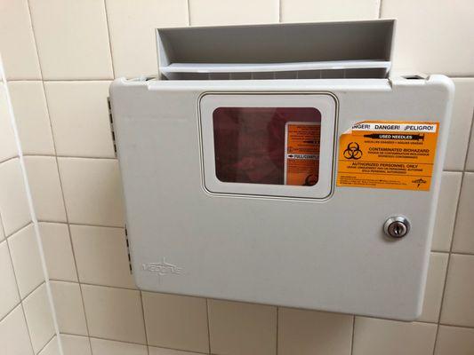 LOOK what my 8 year old son discovered in the bathroom of the ARC in Broomfield CO! A sharps Bio-hazard needle container with a knife on top