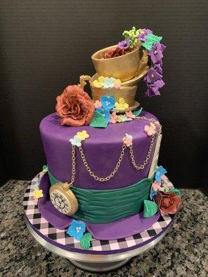 Mad Hatter- vanilla velvet cake with buttercream frosting and handmade sugar paste decorations on fondant