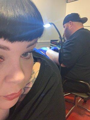 Getting tattooed at Loveland Tattoo Studio in San Pedro by lil Pete