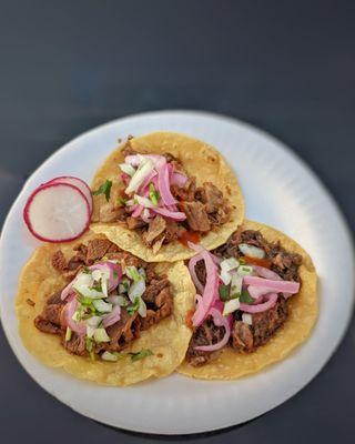 Cabeza, asada, and pastor tacos. One the best tacos I have tasted in Los Angeles.