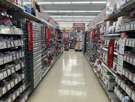 The selection of pipe fittings and fasteners is impressive.