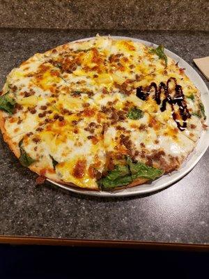 Cauliflower crust, Alfredo sauce, hamburger,  spinach.