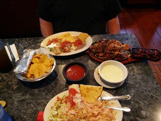 Our food.....chicken chimi and some kind of fajita dish that didn't say fajita .  sssooooo good