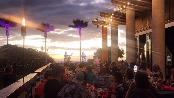 Maori dancers; evening view.