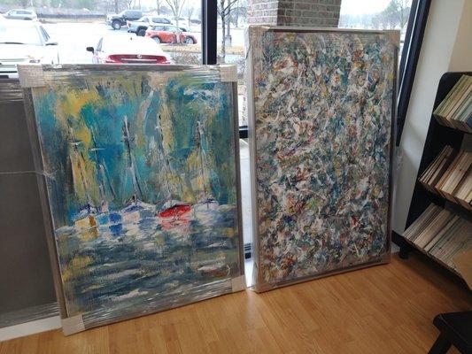 Stretched canvasses with "float" framing. Float frames are very "in" now!