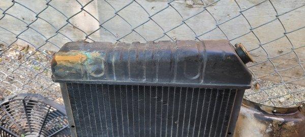 This is the leaking radiator that came with with the car.