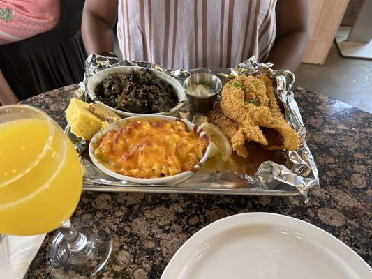 Fried catfish, mac and cheese and collard greens.