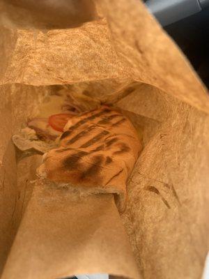 Surprise! When you open the "melt" paper bag your sandwich is a hot mess