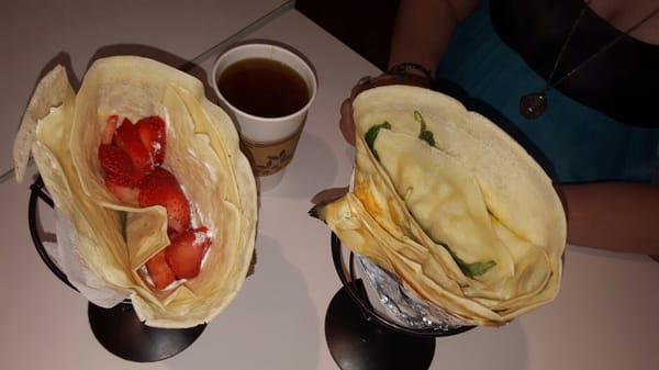 Strawberry whipped cream crepe and spinach egg and cheese crepe