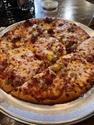 Meat and cheese deluxe pizza