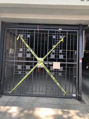 Broken garage door still not repaired for weeks