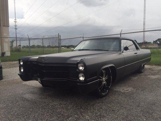 67 coupe deville came for a full color change.painted everything black including engine bay, trunk floor, floor, all the chrome trimmings