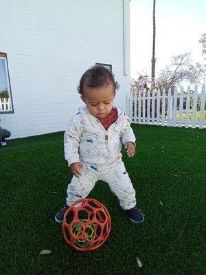 My son playing outside at daycare