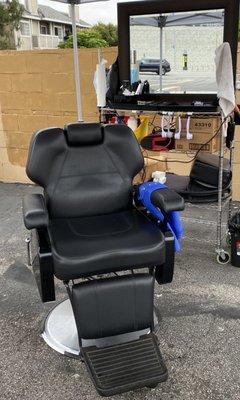 Quarantine outdoor barber chair.