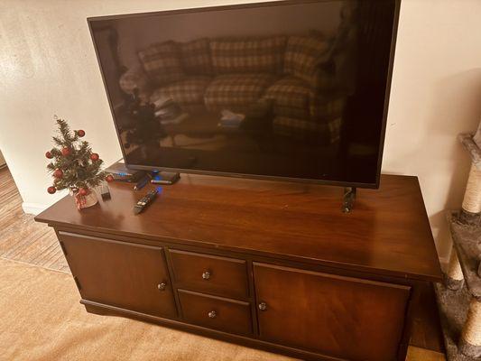 Beautiful natural wood, cherry finish tv cabinet.