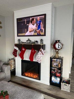 My brand new fireplace! They even mounted my TV for me!!