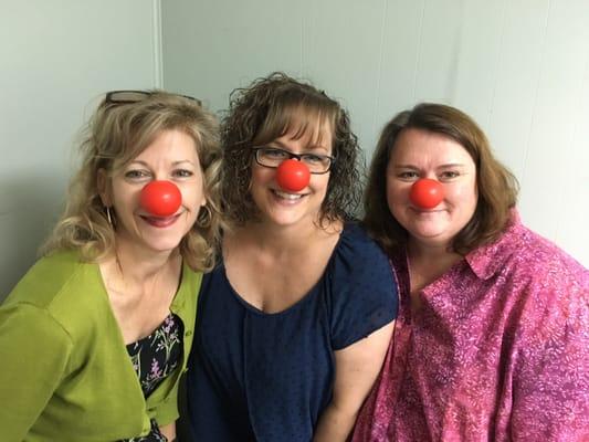 Bringing attention to children in need on nat'l Red Nose Day: Owner Karen Lee, Admissions Dir. Kathy DeMellier and Clinical Dir. Penny Baker