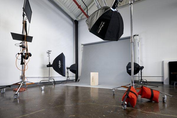 The studio is fully equipped with lighting, backdrops, and accessories.