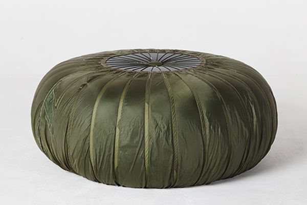 Unique Product design: we used a vintage parachute to create this unique ottoman!