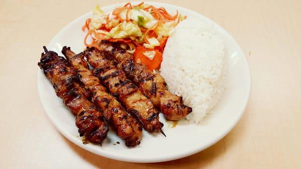 Cambodian Chicken sticks kebabs with pickle salad. Delicious!!!