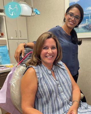 A happy patient with her new implant crown!