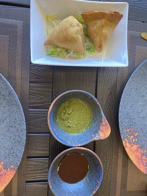 Vegetable samosa with mint and tamarind sauces