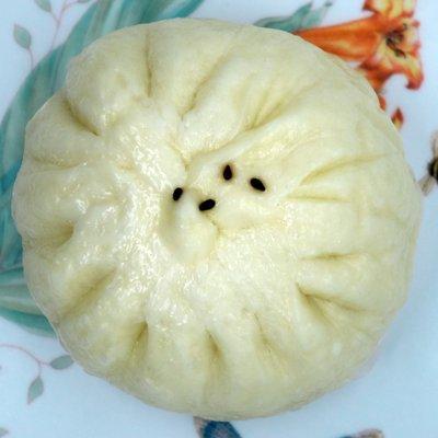 Steamed Beef Bun (牛肉包子): $2.50. Take-out. The steamed pork bun looks identical from the outside except it doesn't have the sesame seeds.