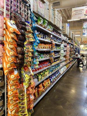 What a great worker - look how organized the snack aisle is!