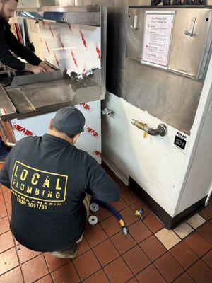 Commercial gas stove install after hours in San Rafael.