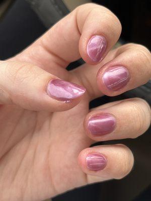 Polish on my skin, the finish is bumpy & you can see the whites of my nails through the polish