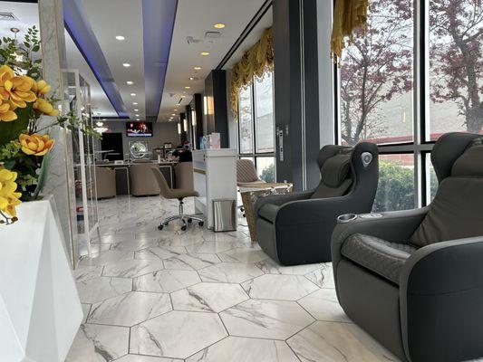 Waiting area with massage chairs