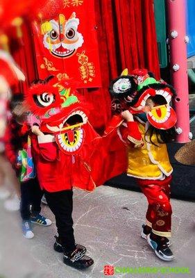 Our San Mateo students performing a lion dance during our 2022 Chinese New Year celebration