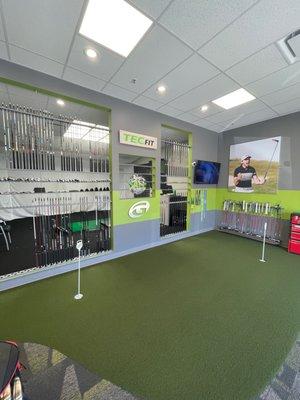 Putting area with a nice display of shafts and putters to try out.