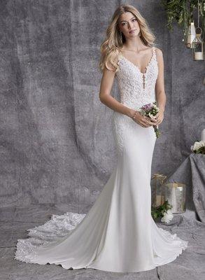 Crepe and lace wedding dress with plunging neckline and gorgeous cathedral train