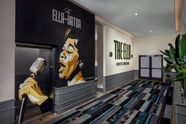 The entrance to the Harmony Building, featuring Ella Fitzgerald on the Mic