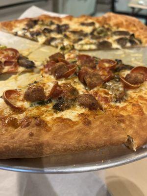 Fungi za with Italian sausage and pepperoni. We love it.