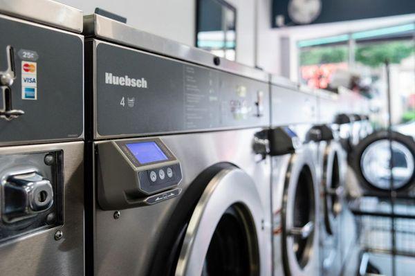 Our Washers and Dryers accept credit cards and quarters