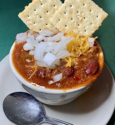 Chili with cheese and onions.