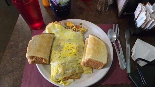 Two egg veggie omelet with sourdough toast