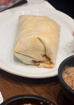 Burrito with raw tortilla.