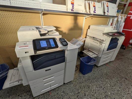 Printer-copiers where you can easily make prints and copies and pay at the machine. No human interaction required.