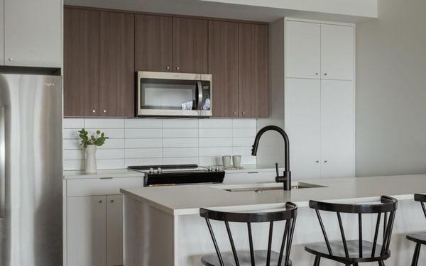 Spacious kitchen with island and modern finishes.