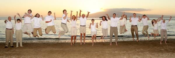 The Uhlmanns jumping for joy at sunset Maui