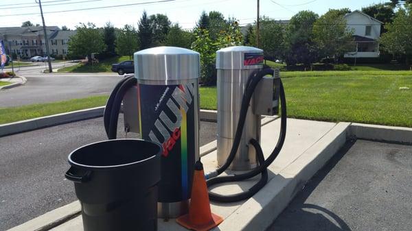 Vacuum cleaners stations before and after wash.