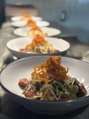 Pork Belly with shave lettuce and crispy leeks