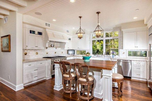 Beautiful Del Mar Kitchen Design with Custom Interior Lighting, Fine Accessories and High End Bar Stools.