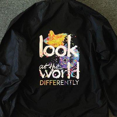 Heat press transfer print on a windbreaker jacket.